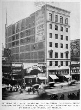 Garrick Theatre in 1925, with the Singer Building on the right